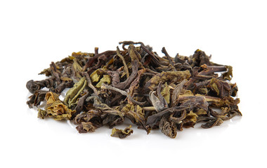 Heap of dry green tea isolated on white background