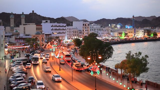 Traffic at the corniche of the old town of Muttrah at night, Sultanate of Oman