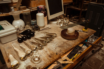 Fototapeta na wymiar work space in a glassware workshop with tools