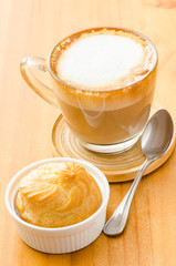 Hot coffee (cappuccino) and choux,breakfast