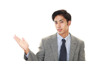 案内するビジネスマン