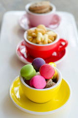 macaroons and cookies in cup