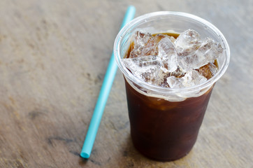 black ice coffee on wooden background