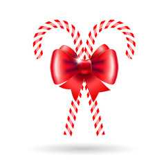 Candy canes with red bow.