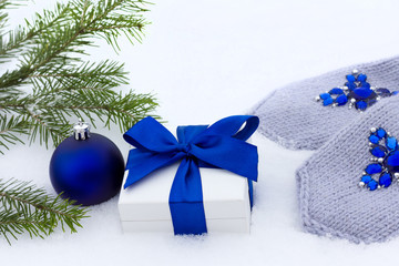 gift and blue gloves