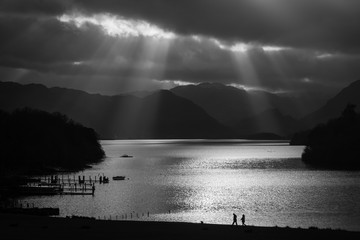 Derwentwater Sun Rays. A high contrast black and white image of sun rays being cast over Derwentwater, Cumbria in the English Lake District National Park.