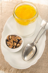 greek yogurt with acacia honey in a glass