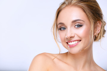Naklejka premium Portrait of beautiful woman on white background