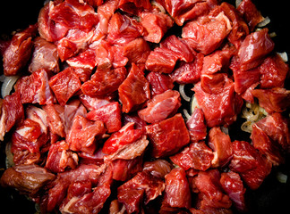 Fresh raw meat on a pan. Ingredients for traditional turkish mea