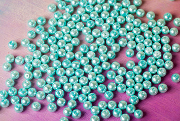 Pile of pearl on the pink background