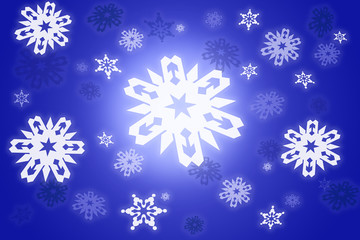 Fototapeta na wymiar Christmas graphic background with white falling snowflakes on blue background