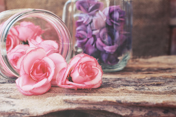 Obraz na płótnie Canvas Vintage roses on the jar