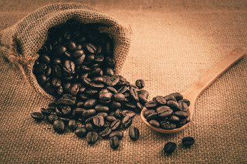Coffee beans in coffee bag on sack