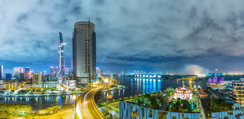 Ho Chi Minh City, Vietnam - September 2nd, 2015: architectural city at night with lights on...