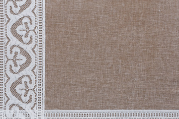 Fototapeta premium Natural linen texture with white lace