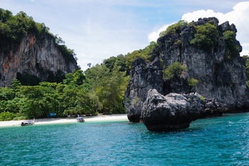 Two Boats on the Small, Secluded Beach of the Trees Covered Island. Koh Hong Island at Phang Nga Bay near Krabi and Phuket. Thailand.