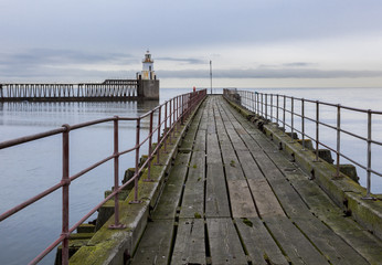 Blyth Harbour Piers, Blyth, Northumberland, England, UK. Taken on dull overcast morning.