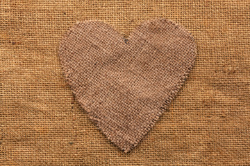 Conceptual image of the heart  lying on sackcloth