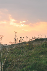 A beautiful sunset over the Atlantic ocean in Newquay in Cornwall in England - toned photo
