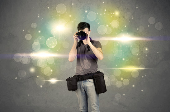 Photographer with flashing lights