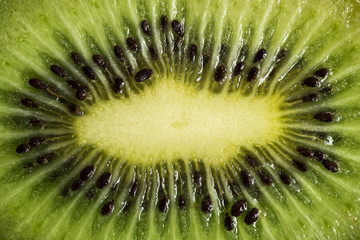 Macro shot of a kiwi slice background