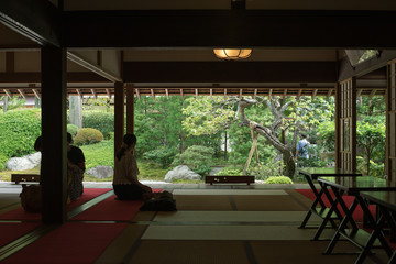 People enjoying the view of Japanese garden at Jomyoji Temple in Kamakura