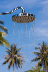 Shower on the background of blue sky at hotel