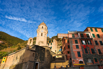 Vernazza Liguria Italy / Vernazza village with the church of Santa Margherita di Antiochia. Cinque terre, national park in Liguria Italy. UNESCO world heritage site