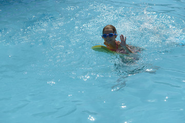 Swimming Girl Looking at Camera