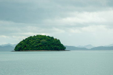 Naklejka premium The Islet in the Bay on a Rainy Day. Islands at Phang Nga Bay near Krabi and Phuket. Thailand.