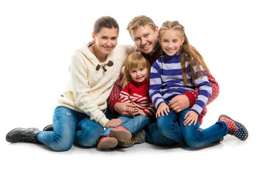 happy family portrait in warm clothes