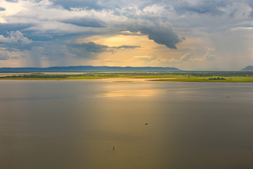 Wonderful sunset after the rain at reservoir