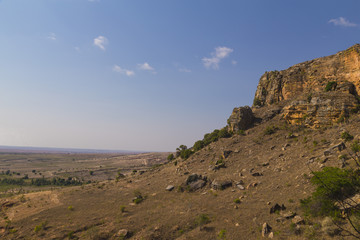 Rocky hill view on a blue sunny day in Isalo National Park landscape, Madagascar, Africa.