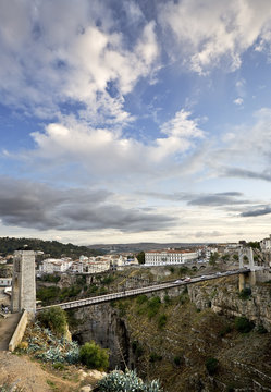 Algeria. Constantine - Sidi M'cid Bridge. View of town and 164 m long suspension bridge over gorge 175 m deep.