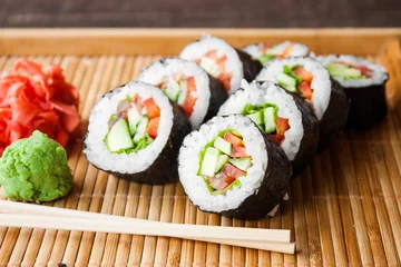 Foto op Canvas vegetarian sushi roll © yuliiaholovchenko