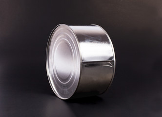 can on black background