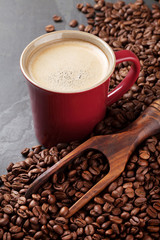 Coffee cup and beans