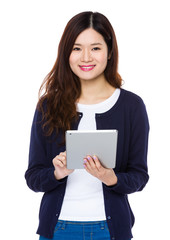 Asian Young Woman use of the tablet pc