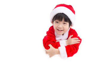 Little asian boy  in Santa Claus  uniform with an empty banner