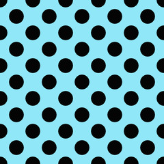 Black polka dots on blue background