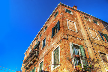 orange building with brick facades in Venice
