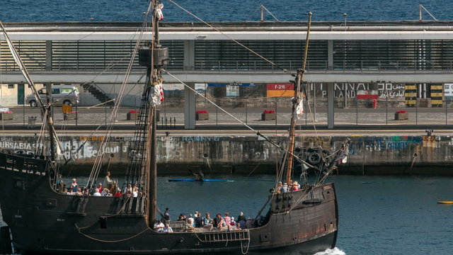 Replica ot vessel Santa Maria is passing the port of Funchal timelapse