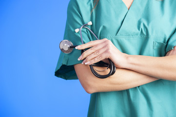 Medical blue background doctor with a stethoscope