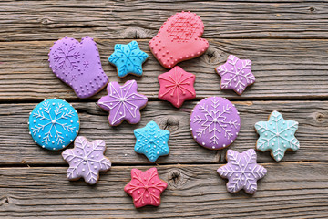 Colours gingerbread on wooden background