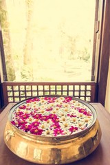 Flowers floating in water.