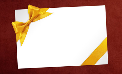 cards with gift golden ribbon bow Isolated on red background