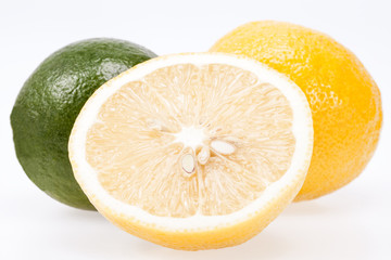 some lemons and lime isolated on white background, close up
