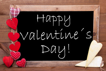 Fototapeta na wymiar One Chalkbord, Red And Yellow Hearts, Happy Valentines Day