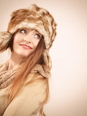 woman wearing wintertime clothes fur cap