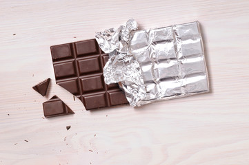 Chocolate bar with silver wrapping top view